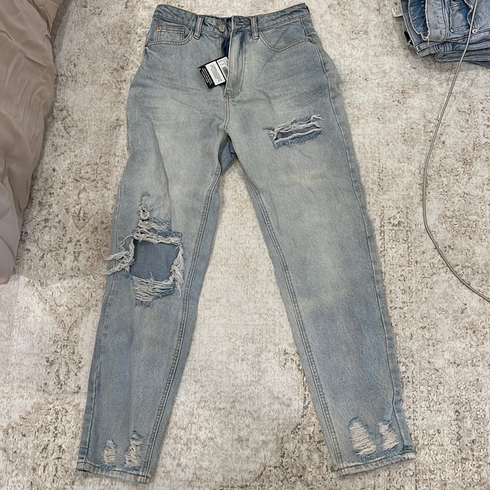 Distressed high rise mom jean